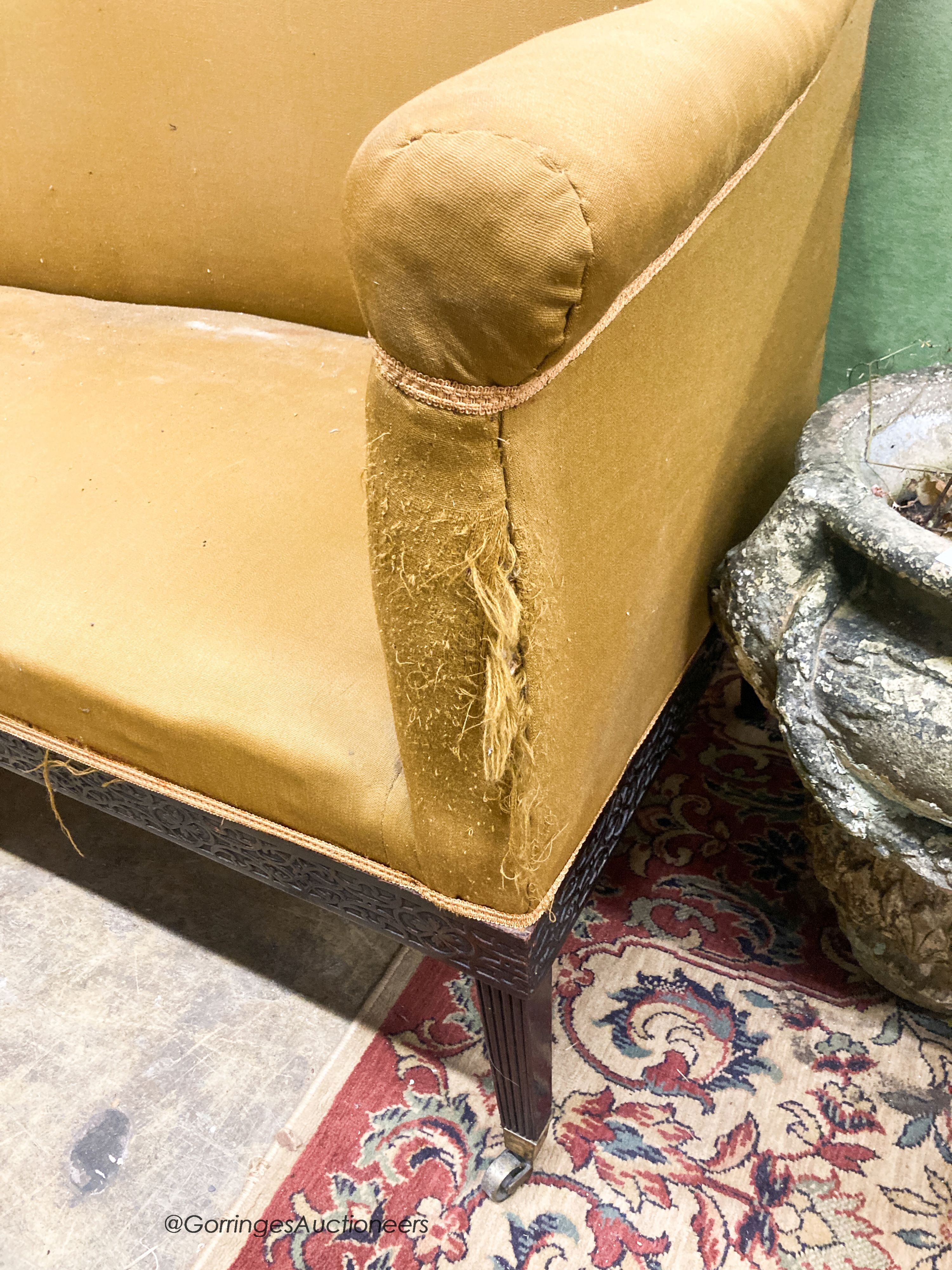 A Regency ebonised settee, W.162cm D.70cm H.120cm